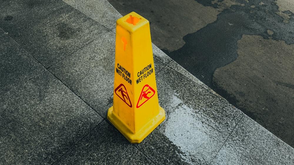 Wet Floors & Icy Entrances: How Weather Impacts Premises Liability